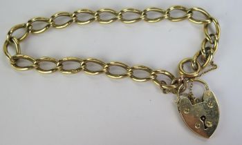An 18ct Gold Curb Link Bracelet with 9ct gold 'padlock' clasp, 18ct 23.8g and 9ct 3.05g