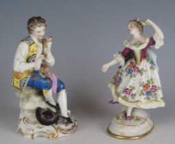 A Neopolitan porcelain figure of a dancing girl, 14cm high together with a continental figure of a