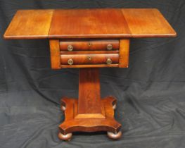 A 19th century mahogany work table, the top with two hinged leaves, with two short drawers, raised