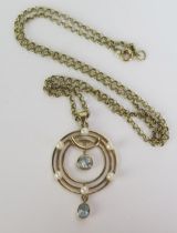 A 9ct Gold, Aqua Marine and untested Pearl Target Pendant, Sheffield hallmarks, c. 38.8mm drop and
