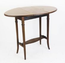 An Edwardian mahogany and chequer strung occasional table the rectangular top with two hinged