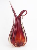 A mid 20th century red Murano glass vase, possibly to a design by Flavio Poli, for Seguso. with