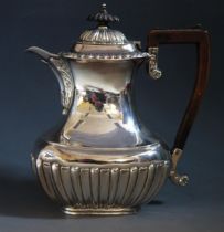 A Victorian silver coffee pot, maker Charles Edward Nixon, Sheffield, 1898, of barge-shaped outline,