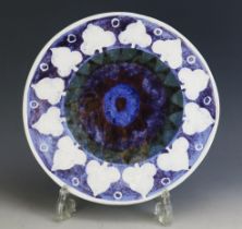 A Rare (possibly unique) and Early Troika Pottery "Sun" Plate or Wall Plaque decorated with blue,