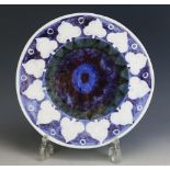 A Rare (possibly unique) and Early Troika Pottery "Sun" Plate or Wall Plaque decorated with blue,