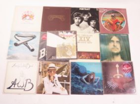 A collection of assorted 33 and 45rpm records, artists include Led Zeppelin, 10cc, Mike Oldfield,