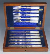 A set of five mother-of-pearl handled fruit knives and forks contained in a mahogany case.