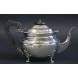 A George V silver bachelors teapot, maker John Round & Son Ltd, Sheffield, 1911, monogrammed, of