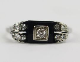 A French Deco 14ct White Gold, Diamond and Onyx Ring, c. 2.5mm principal stone, various marks and