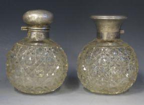 Two clear glass and silver mounted scent bottles, various makers and dates, of globular form, one