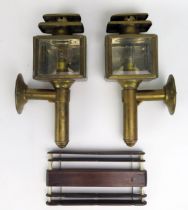 A pair of small brass coach lamps, fitted for electricity, 23cm high, together with a mahogany and