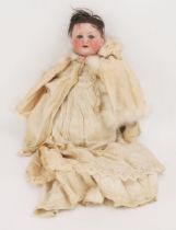 Armand & Marseille Bisque Headed Doll with weighted blue glass eyes, open with two front teeth