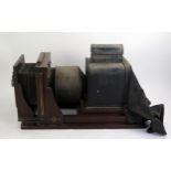 Hunter Penrose Ltd, a mahogany and brass mounted enlarger or process camera for converting