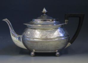A George III silver teapot, maker Thomas Wallis (II) & Jonathan Hayne, London, 1814, crested and