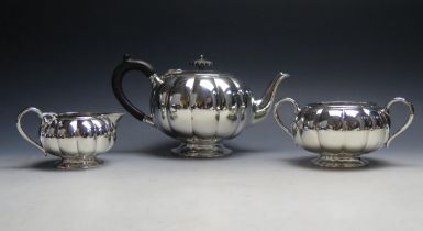 A George V silver three-piece tea service, maker Francis Higgins & Sons Ltd, London, 1924, of