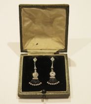 A Pair of Art Deco Style Diamond Drop Pendant Earrings in platinum setting, c. 5.3mm old cut
