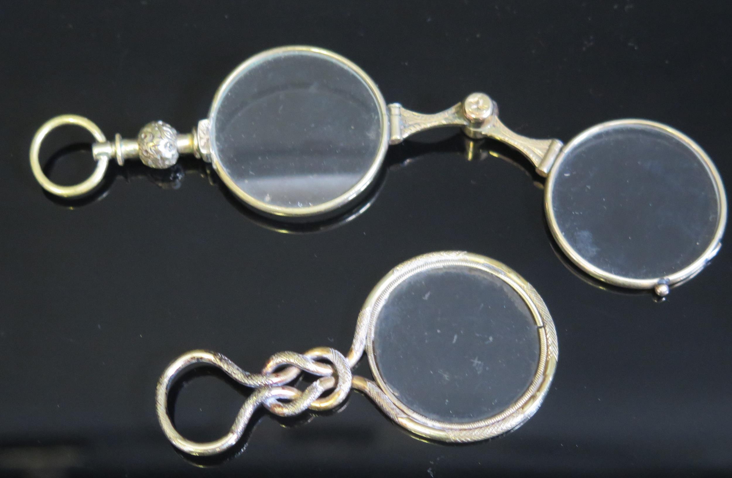 A pair of 19th century gilt metal framed lorgnettes, together with a gilt metal framed monocle. (2). - Image 2 of 2