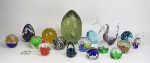 A green glass dump, 21cm high, together with assorted paperweights and glass ornaments.