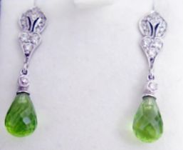 A Pair of 18ct White Gold, Diamond and Peridot? Pendant Earrings, c. 28.9mm drop, 3.29g