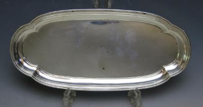 A George V silver pin tray, maker Adie Brothers Ltd, Birmingham, 1932, of oval outline with reeded