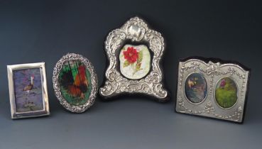 Four assorted small silver photograph frames, various makers, dates and sizes. (4).