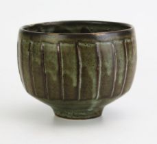 DAVID LEACH (1911-2005) for Lowerdown Pottery; a fluted porcelain bowl covered in green/grey