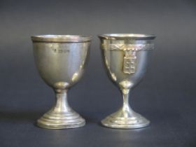 An Edward VII silver egg cup, makers mark worn, Chester, 1903, together with a French silver