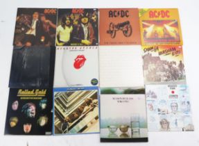 A small selection of 33rpm LP's, artists include AC/DC, The Beatles, Rolling Stones, Sham 69.