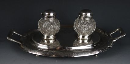 A Victorian silver inkstand maker Charles Boyton II, London, 1865, inscribed, of oval outline with