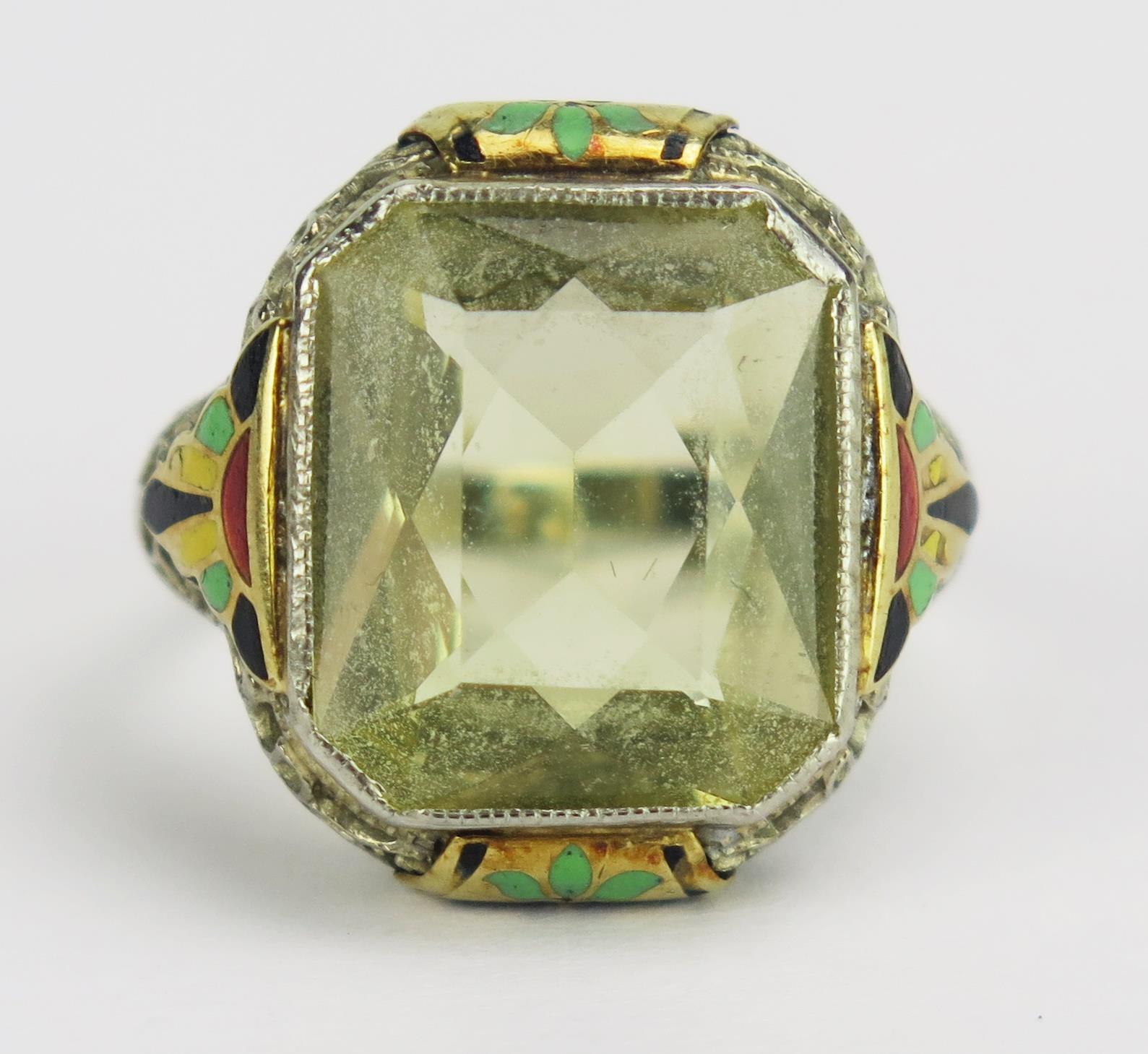A White Gold, Citrine and Enamel Ring in an ornate pierced setting, 13.3x11.8mm stone, size H,