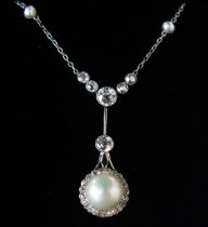 A Pearl or Cultured Pearl and Diamond Pendant on an integrated pearl mounted chain in a precious