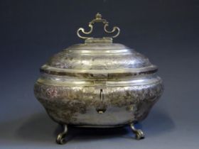 A 19th century continental silver casket, stamped marks, maker WH, of oval form with domed hinged