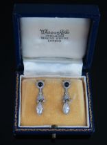 A Pair of Diamond and Onyx Drop Pendant Earrings in a platinum setting, c. 7.8x4.7mm marquis cut