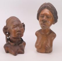 An African carved hardwood bust of a female, 28cm high together with another similar bust 37cm high.