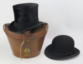 A gentleman's top hat contained in a stitched leatherette case, by Christy's London, together with a