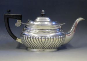 A Late Victorian silver teapot, maker George Nathan & Ridley Hayes, Chester, 1899, of barge-shaped