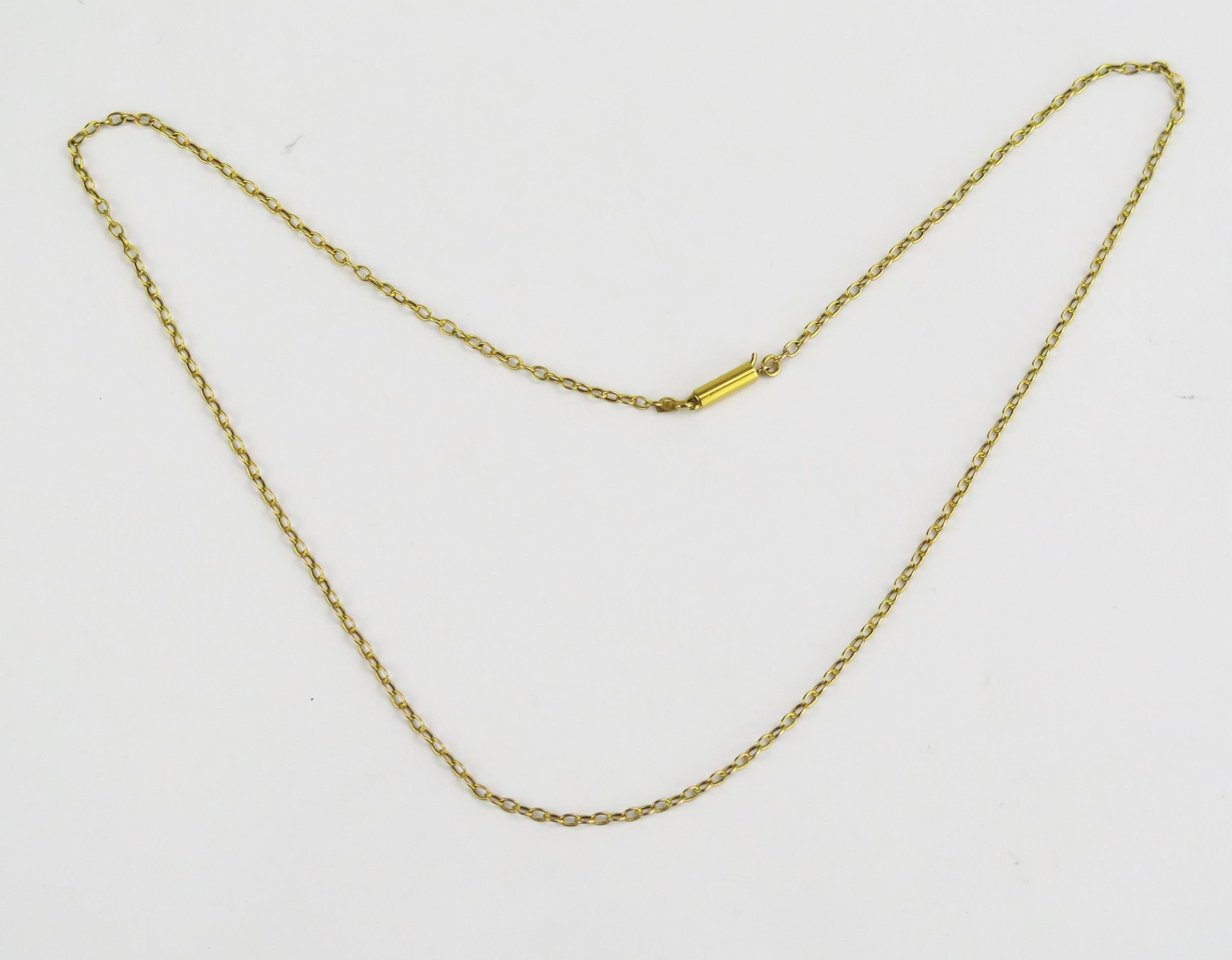 An Antique 9ct Gold Chain with barrel clasp, 16" (41cm), with 9ct stamped panel, 1.15g