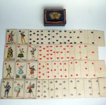 A 19th century set of playing cards contained in a wood box.