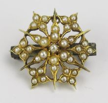 A Victorian Pearl or Cultured Pearl Starburst Brooch, with pendant suspension loop, in an unmarked