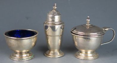 A George VI matched silver three-piece condiment set, various makers and dates, total weight of