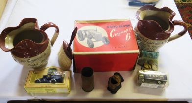 A David Brown Cropmaster 6 diecast tractor, boxed, a treen crumb brush, two stone ware commemorative