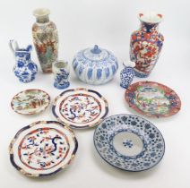 A mixed collection of ceramic wares including a Chinese Imari vase, two blue and white vases, a