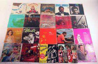 A collection of 33rpm LP's , artists include Blondie, Frank Sinatra, Shirley Bassey, Mario Lanza,