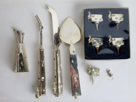 A plated cheese companion set, includes cheese knife, fork, slice, olive forks and vase together