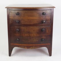 A 19th century mahogany bow fronted chest, containing two deep drawers, raised on bracket feet. 65cm
