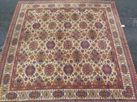 Jas. Shoolbred, a Persian design machine woven carpet, with rows of lozenge medallions and