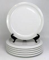 A set of six Alessi Tendentse catering plates, of plain circular form, 31cm diameter. (6).