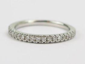 A Platinum and Diamond Half Eternity Ring, stamped PT950 1KS 0.22, size N.5, 4.29g