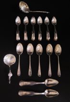 A collection of assorted silver coffee, tea and sifting spoons, various makers and dates, total