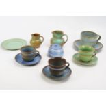 A collection of Prinknash pottery teawares, includes cups, saucers, cream jugs and preserve pot